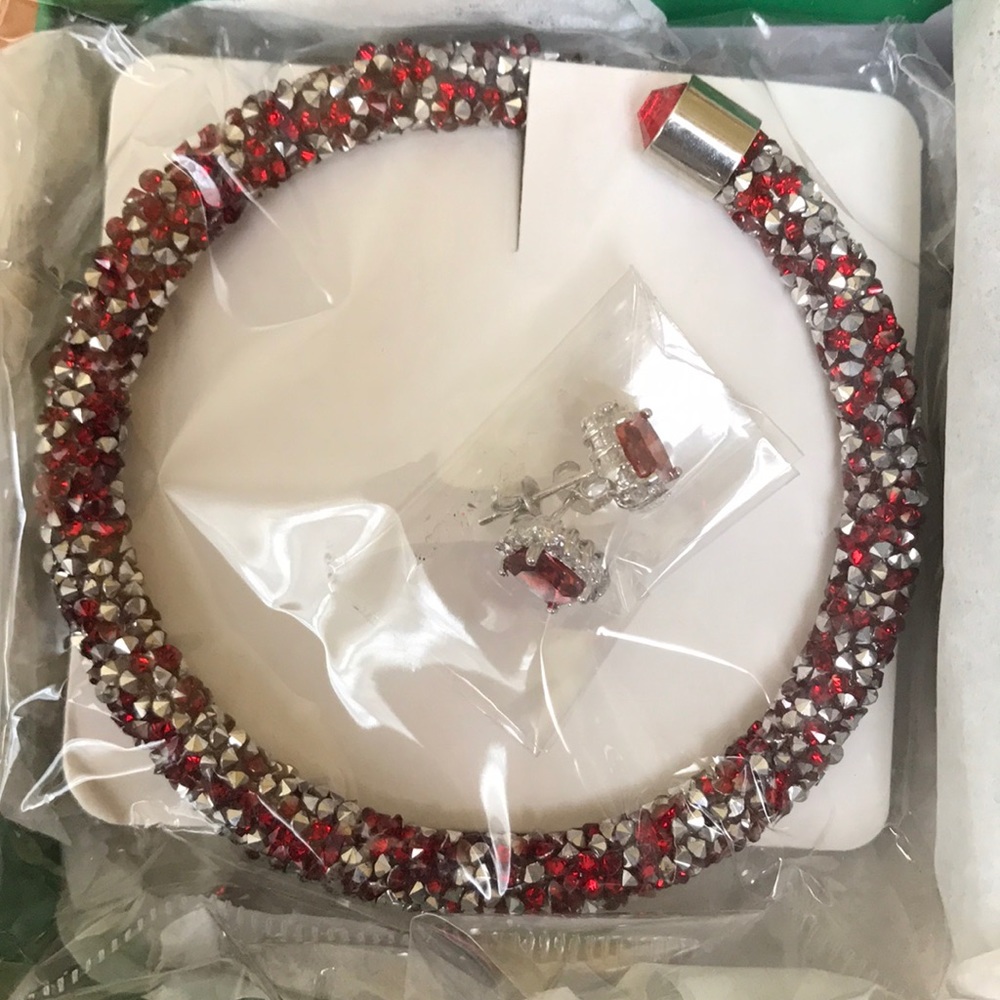 Bracelet and earrings set. Brand new.